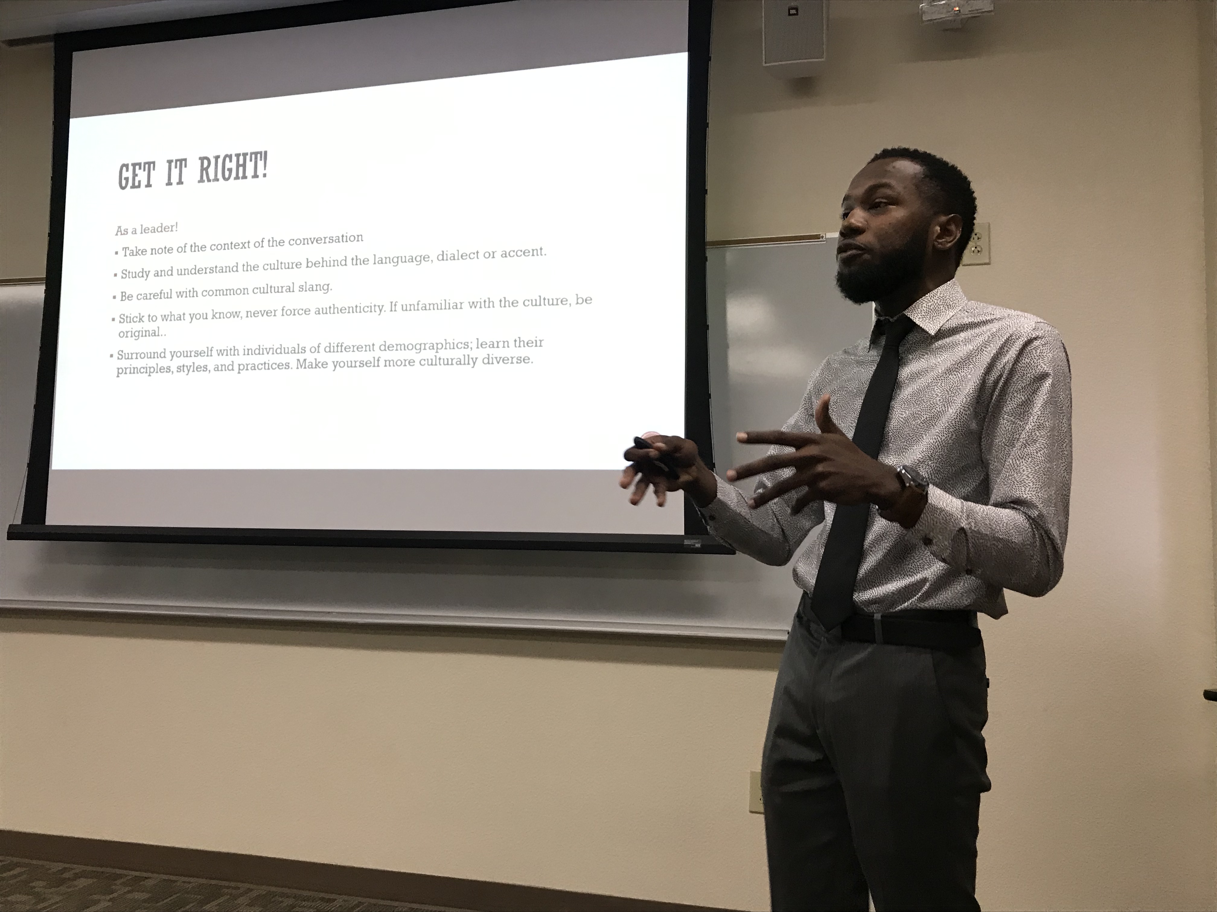 Student Presenting his research as part of a signature experience 