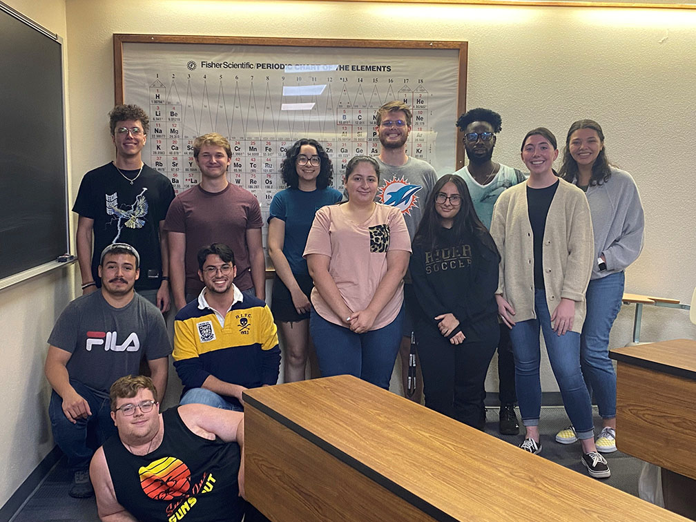 Group of chemistry students gathered for a meeting.