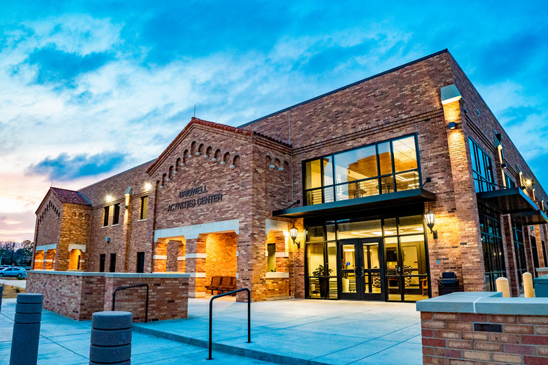 Nighttime exterior of the Bridwell Activity Center