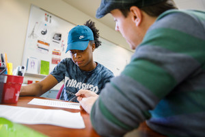 A student with paperwork