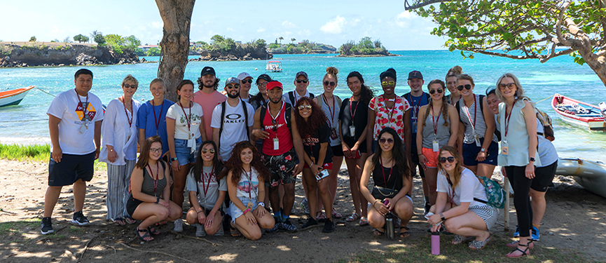 A group of students on the beach in Grenada