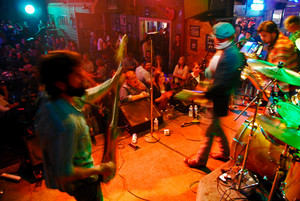 The Josh Weathers Band playing on a stage