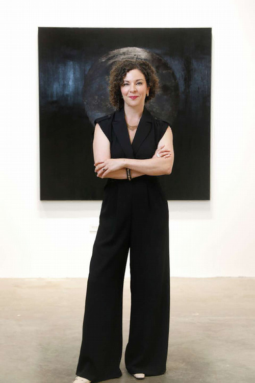 Photo of Erin Cluley standing up