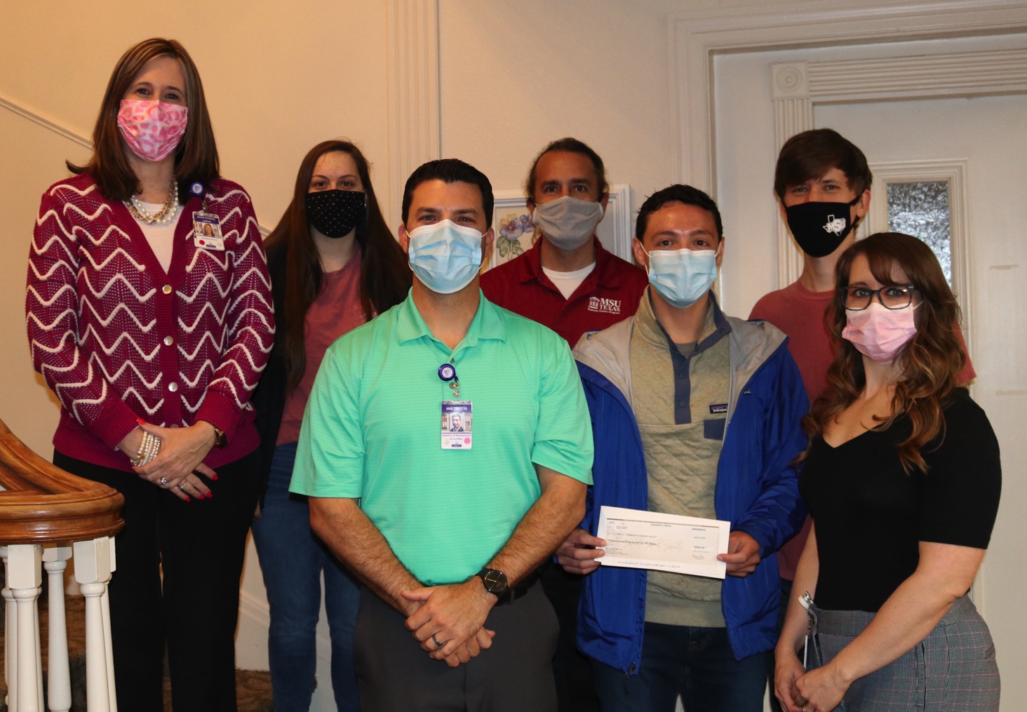 Delivering Redwine Honors Program donation to Hospice of Wichita Falls