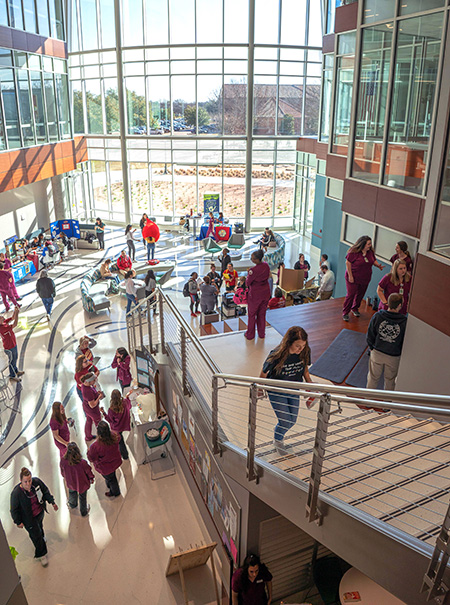 A look down into the lobby of Centennial Hall during the Community Health Fair event hosted by the Gunn College of Health Sciences & Human Services.