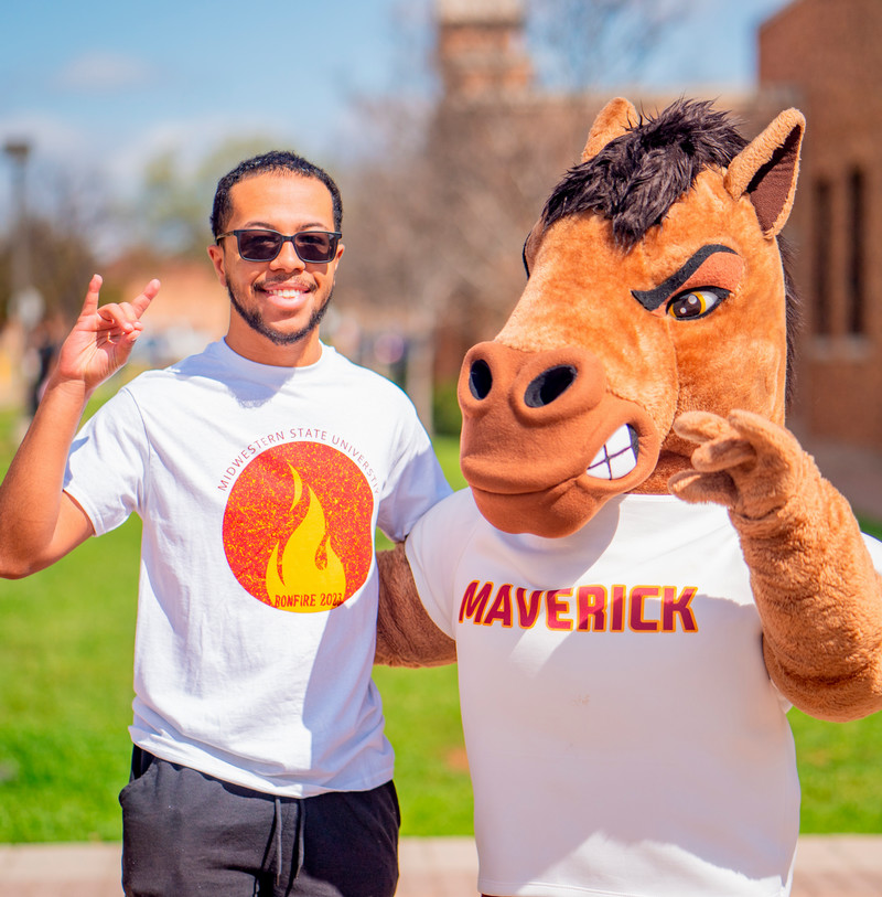 Maverick the mascot and a student
