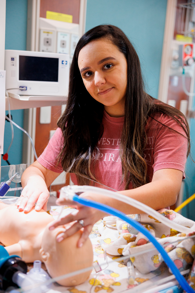 A nursing student in class