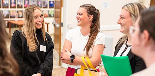 Students gather and converse at the Career Fair hosted by the Career Management Center.