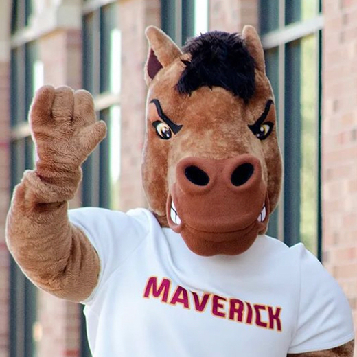 Maverick T. Mustang, the MSU Texas mascot, waves with a pose for the camera.