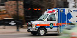 Ambulance driving down the street