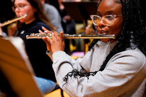 Student Playing the Flute