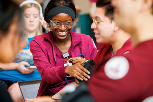 A nursing student smiling