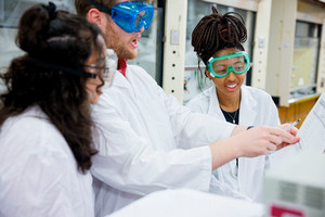 Three Students in Lab Coats