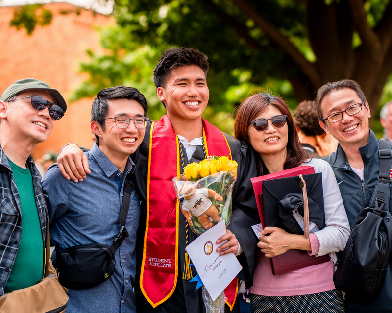 A family posing together after a ceremony