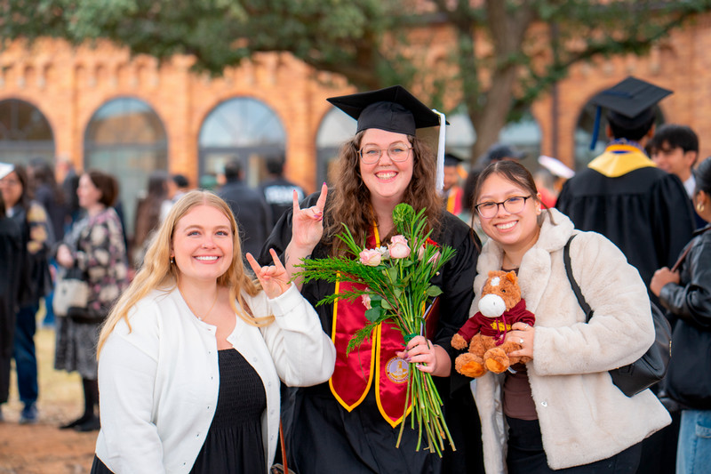 MSU graduate with family