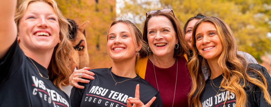 President Haynie with students