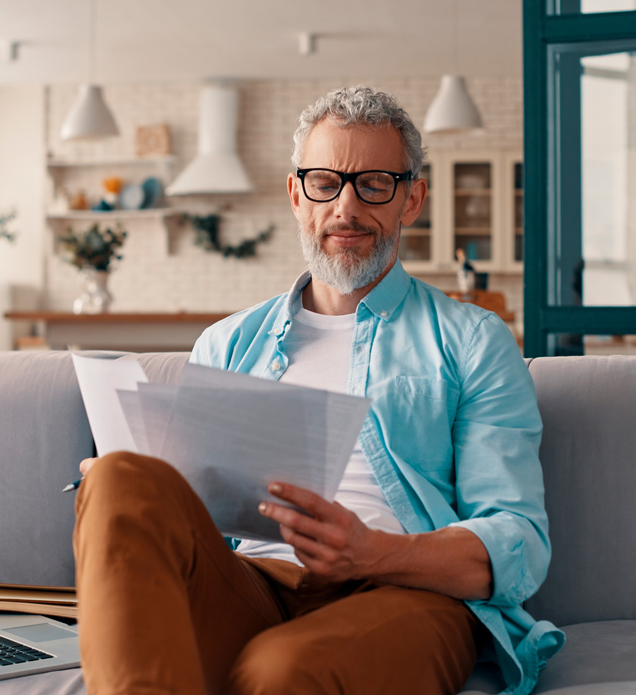 A man looking at paperwork