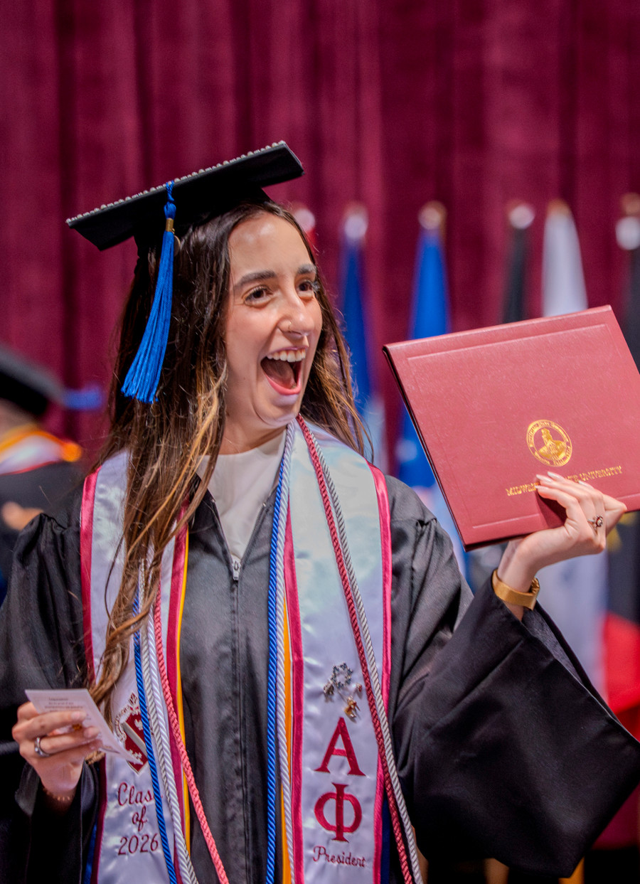 A female student at a graduation ceremony