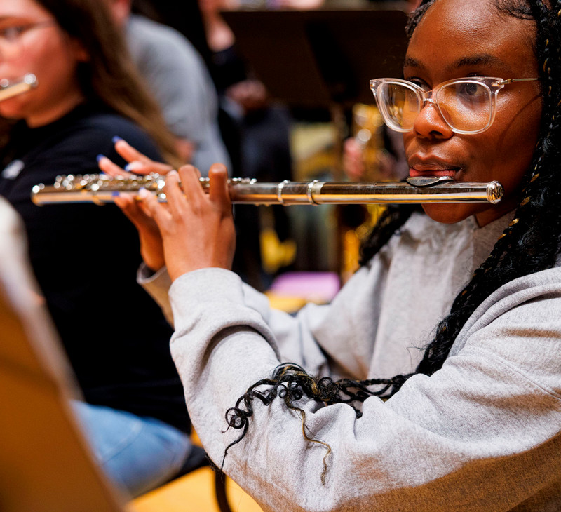 MSU student playing the flute