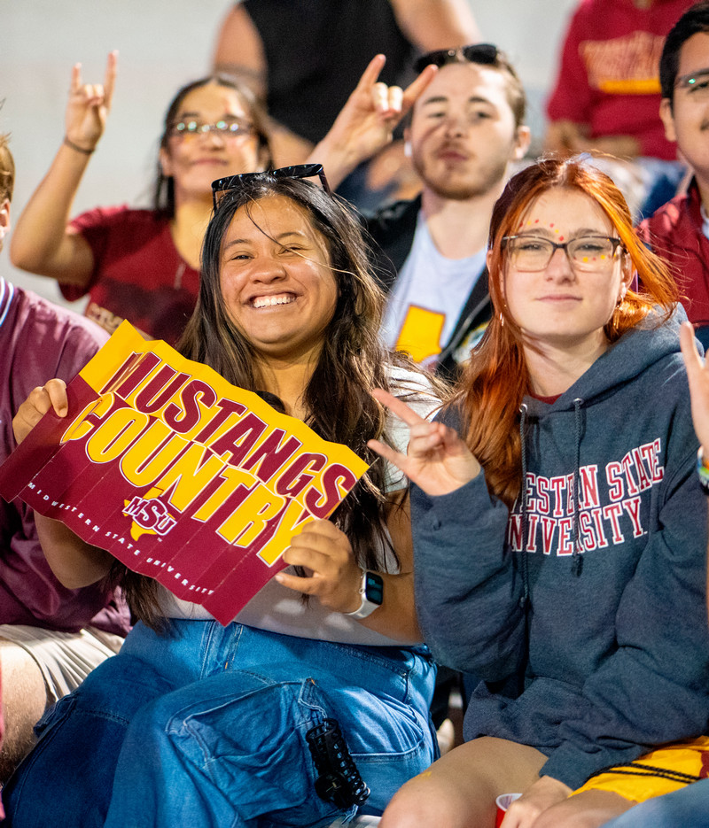Students with stangs up