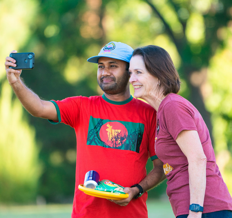 Dr. Haynie taking a selfie with a student