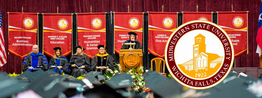 President Haynie on stage during graduation